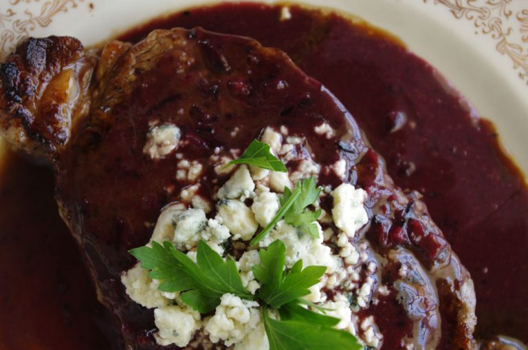 Home 21 New York Strip with Spicy Blueberry Reduction and Blue Cheese